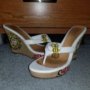 Coach wedges with white leather and bee design